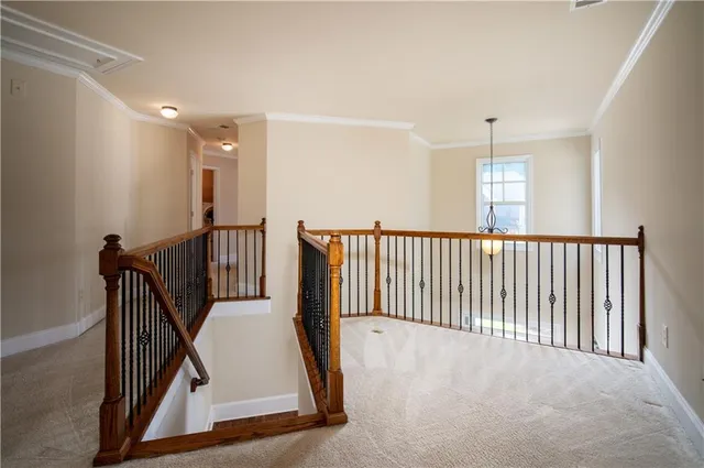 a view of a hallway to a bedroom