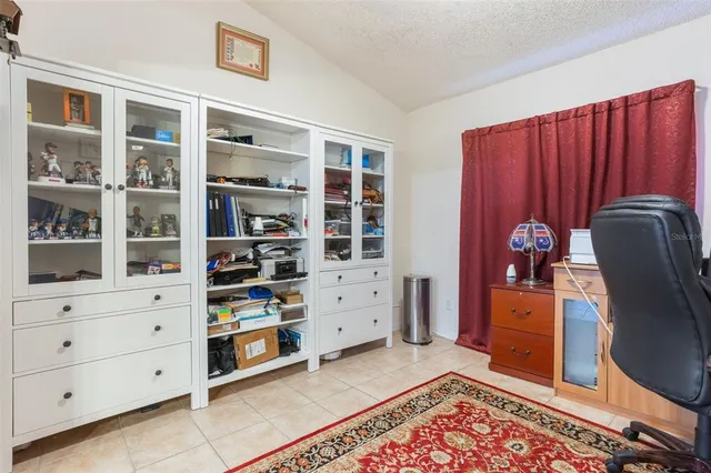 a view of workspace with furniture and wooden floor