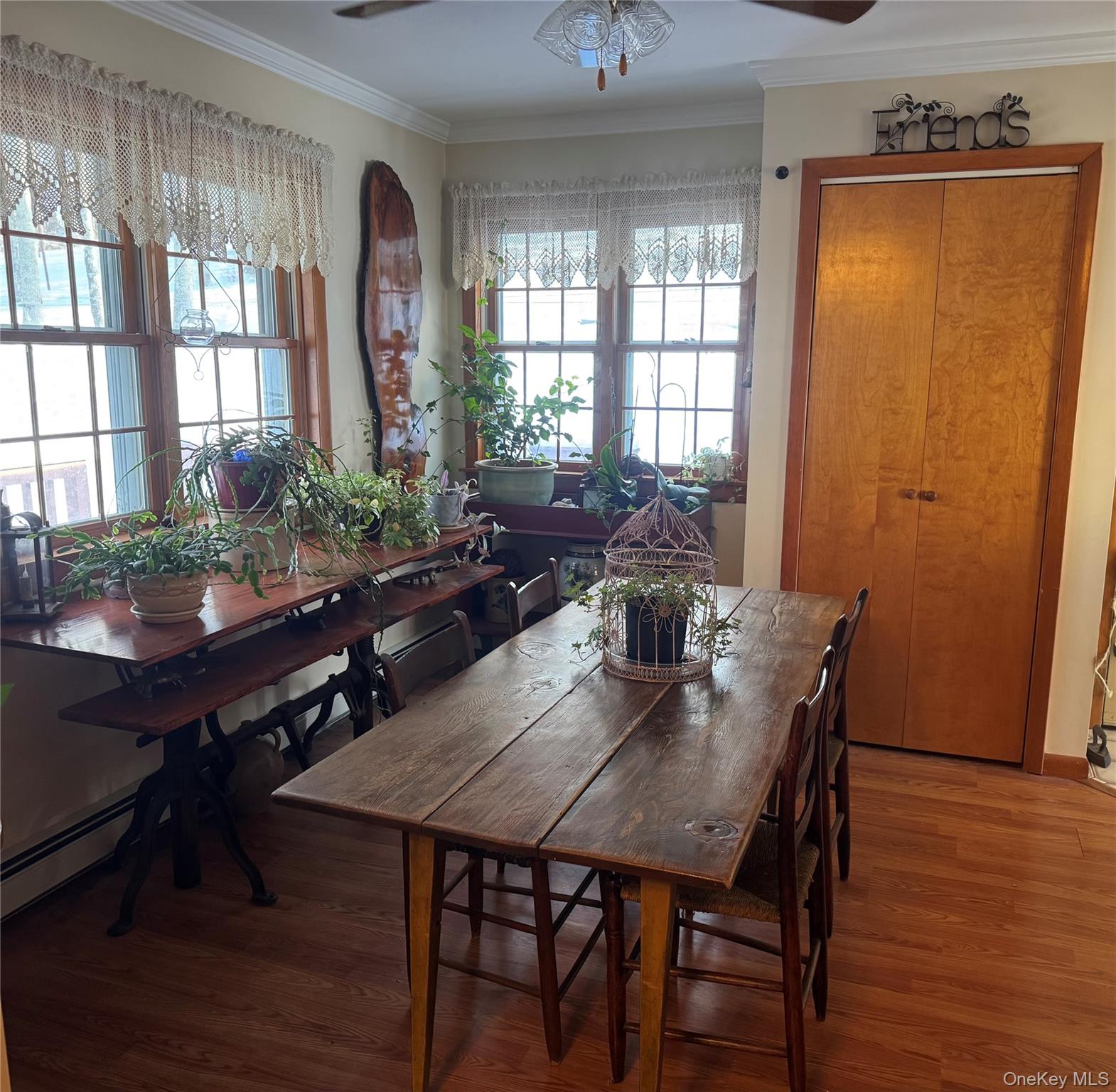 1016 Plains Road Wallkill, NY 12589 - Photo 8 of 14 a view of a dining room with furniture window and wooden floor