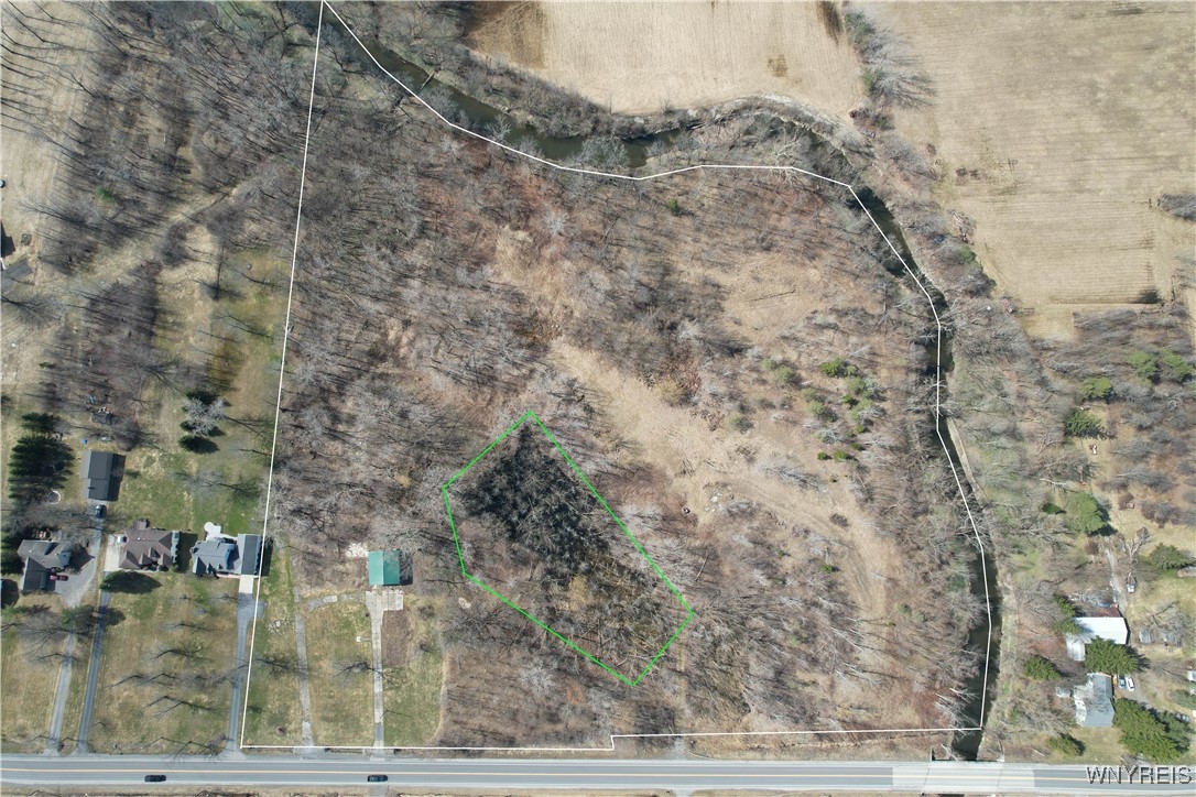 620 Pavement Road Lancaster, NY 14086 - Photo 2 of 10 Wetland area is marked in a green outline.