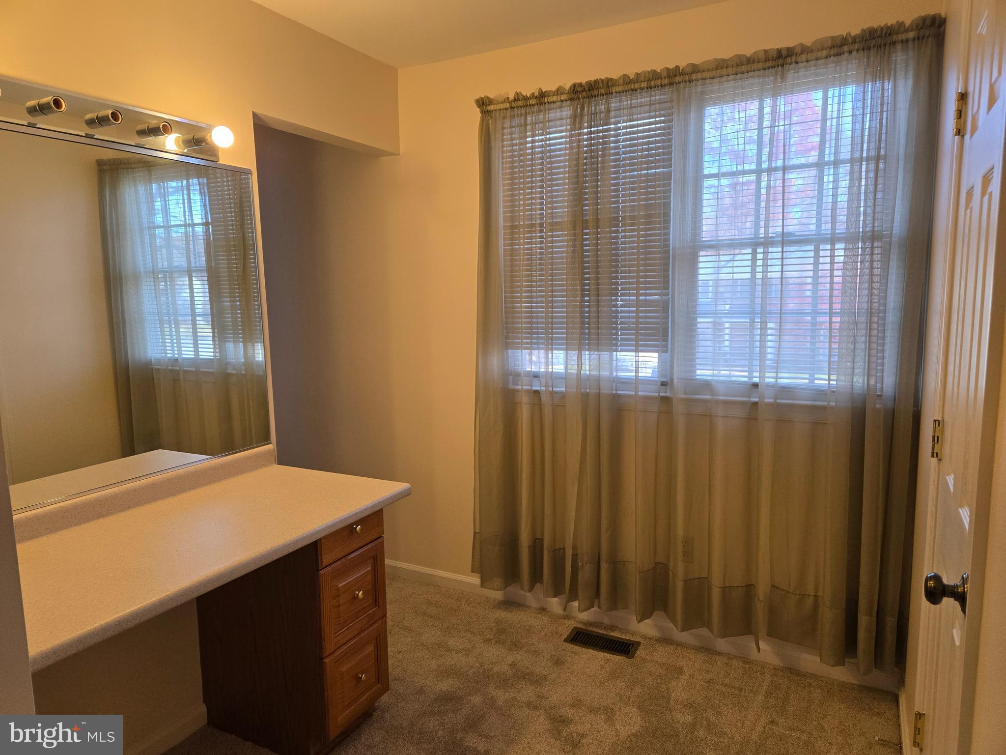 6801 Upper Mills Circle Baltimore, MD 21228 - Photo 23 of 40 a view of a bathroom with a sink