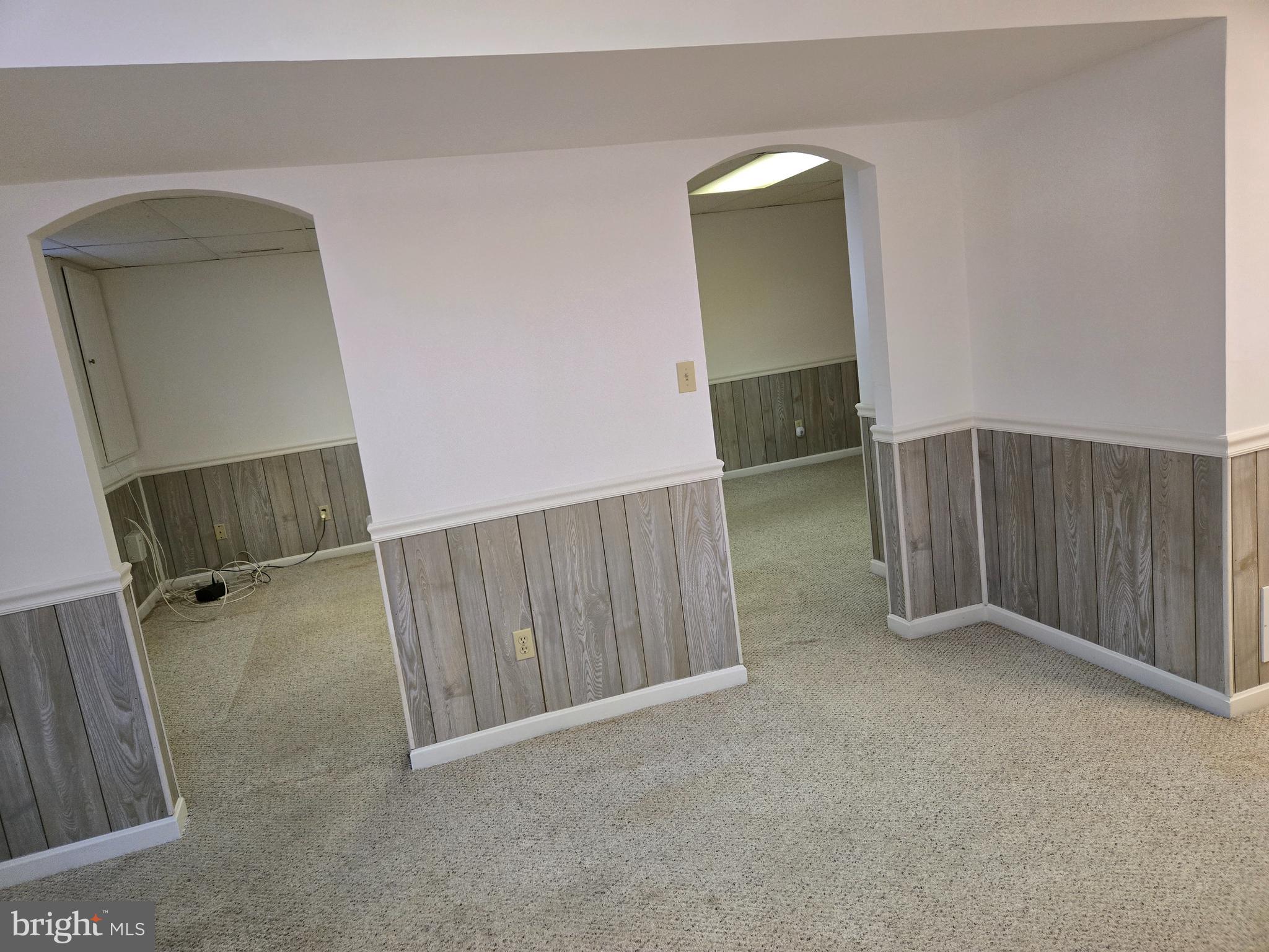 6801 Upper Mills Circle Baltimore, MD 21228 - Photo 34 of 40 a view of an empty room and a window