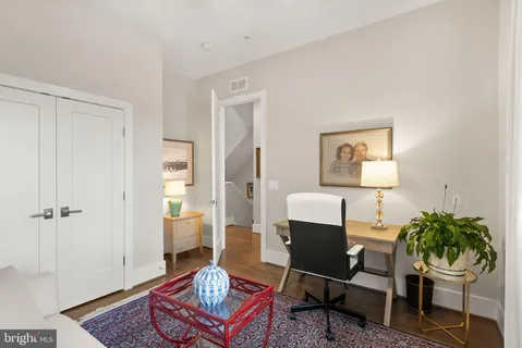 an aerial view of a house with a swimming pool yard and outdoor seating