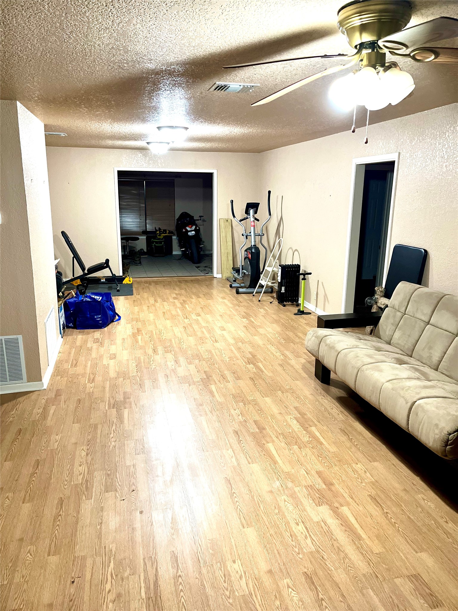 307 5th Street Sutherland Springs, TX 78161 - Photo 13 of 17 a living room with furniture and a flat screen tv