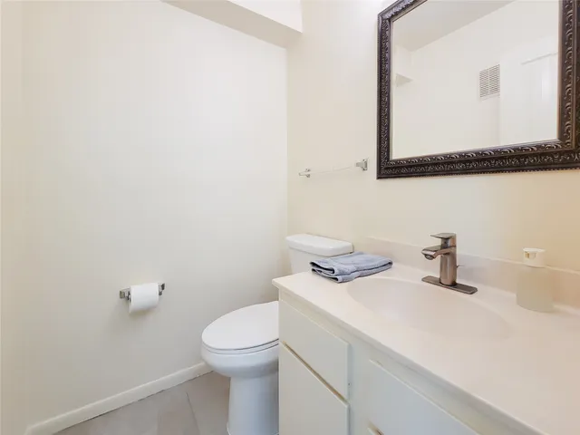 a kitchen with a stove and a refrigerator