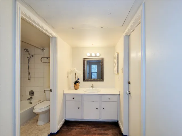 a bathroom with a sink and a washer