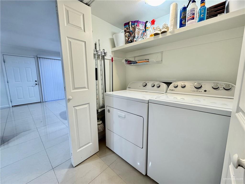 2708 Howard Drive, Unit E3 McAllen, TX 78503 - Photo 15 of 30 a utility room with dryer and washer