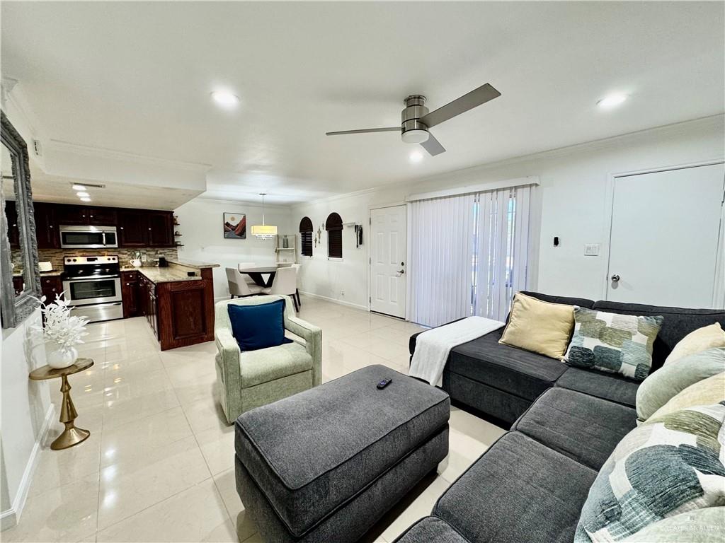 2708 Howard Drive, Unit E3 McAllen, TX 78503 - Photo 10 of 30 a living room with furniture and kitchen view