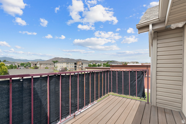 25 West Ridge Road, Unit 25 Saratoga Springs, UT 84045 - Photo 16 of 22 Private balcony with durable composite decking and a metal railing