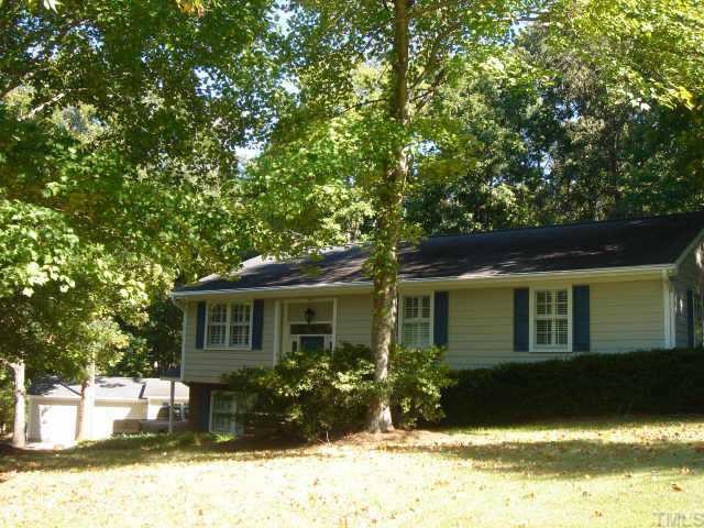 6000 Spring Valley Drive Raleigh, NC 27616 - Photo 1 of 1 a front view of a house with a yard