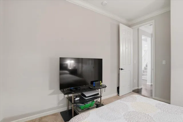 a flat screen tv on a dresser