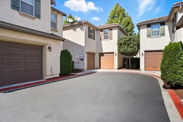 front view of a house with a street