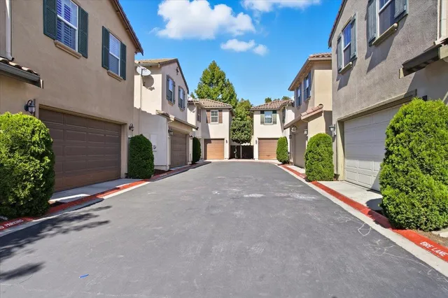a view of road and brick building