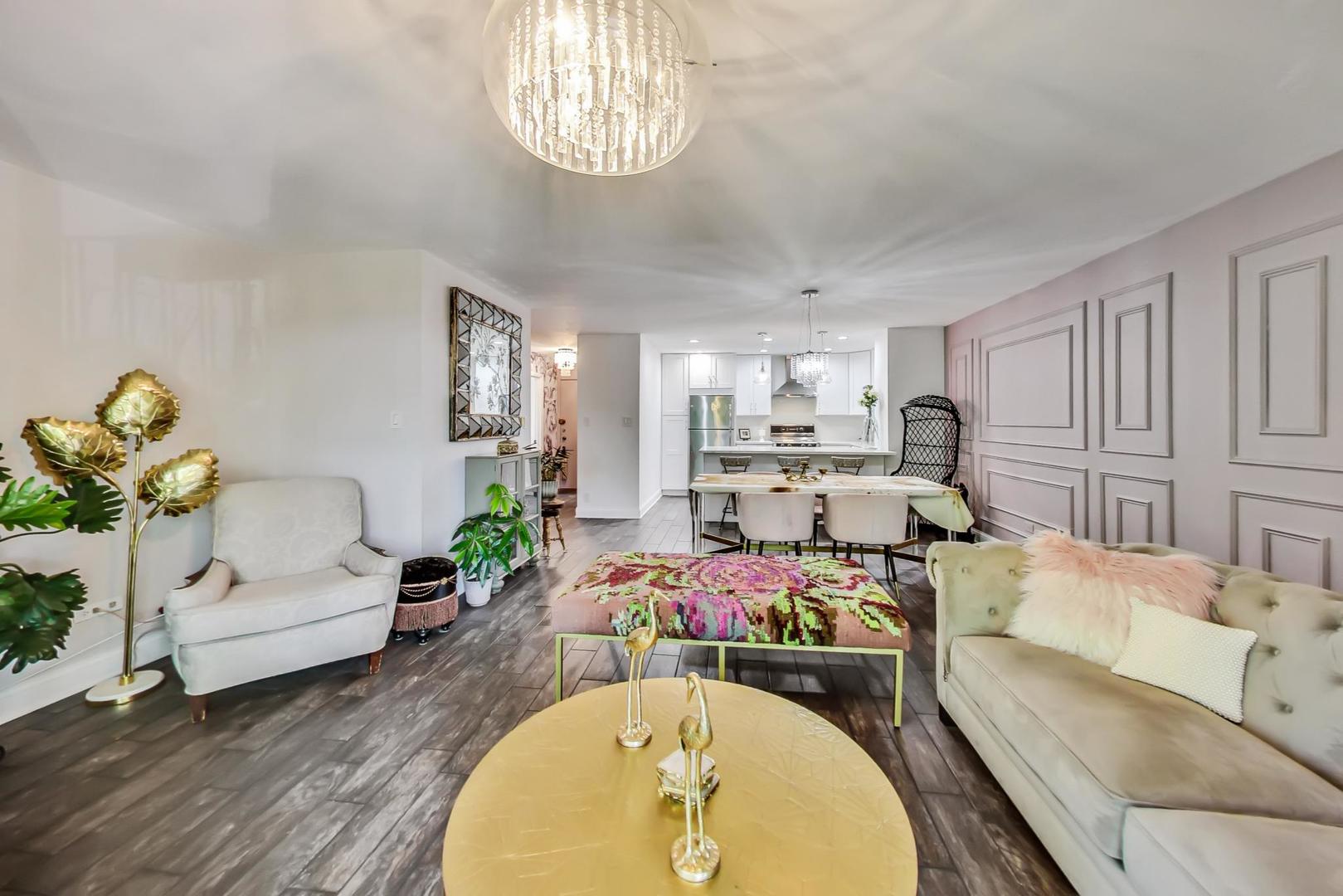 250 Ridge Avenue, Unit 3K Evanston, IL 60202 - Photo 14 of 24 a bed room with furniture and a chandelier