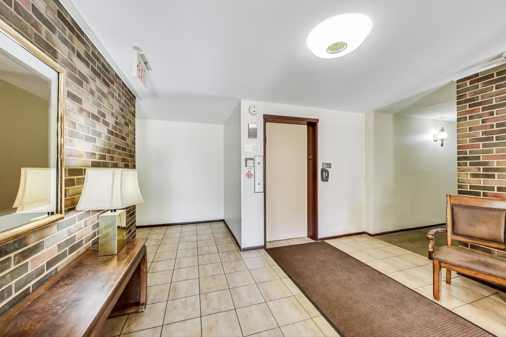 250 Ridge Avenue, Unit 3K Evanston, IL 60202 - Photo 2 of 24 a view of a bedroom with wooden floor and bedroom