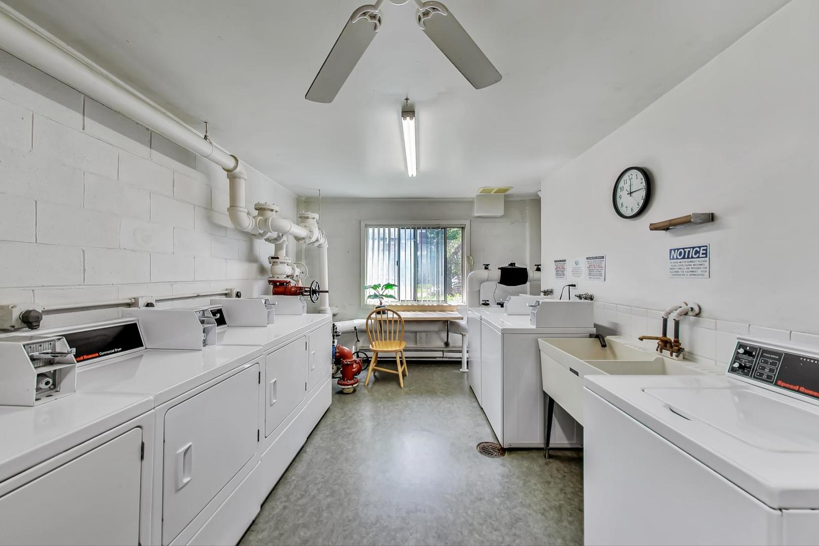 250 Ridge Avenue, Unit 3K Evanston, IL 60202 - Photo 23 of 24 a kitchen with sink and white cabinets