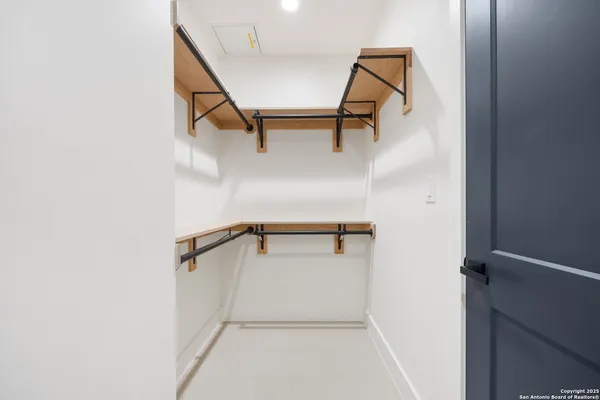 a view of a room with rack on the wall