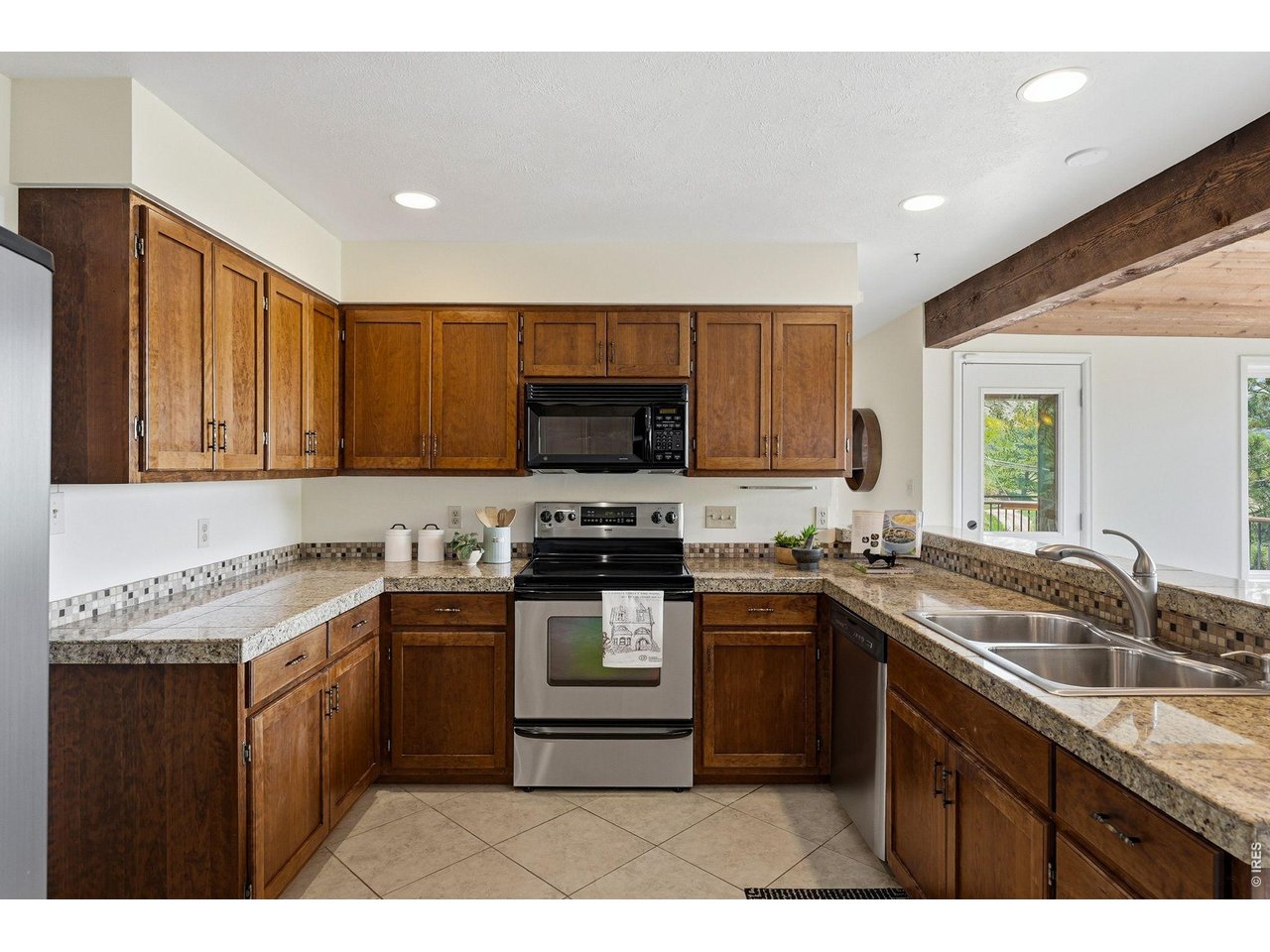 607 North Cedar Brook Road Boulder, CO 80304 - Photo 12 of 36 Spacious kitchen with storage on all sides