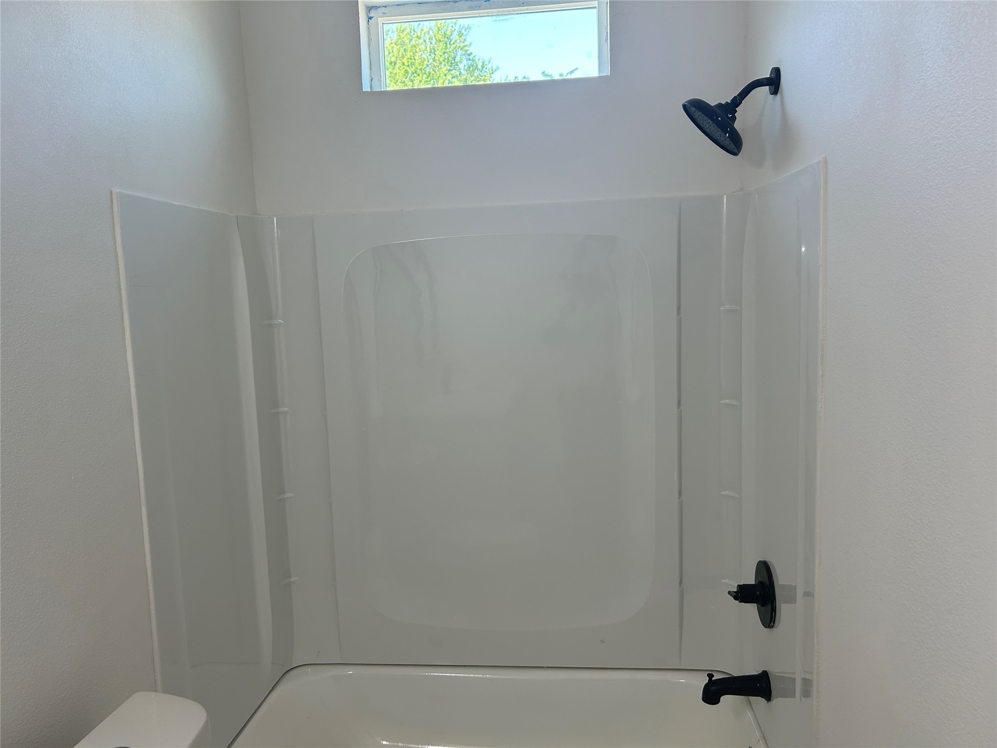 8203 Sparta Street, Unit B Houston, TX 77028 - Photo 8 of 12 a bathroom with a shower