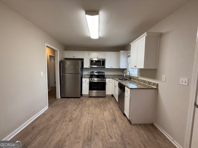1068 Longshore Drive Decatur, GA 30032 - Photo 3 of 9 a kitchen with granite countertop a refrigerator and a stove top oven