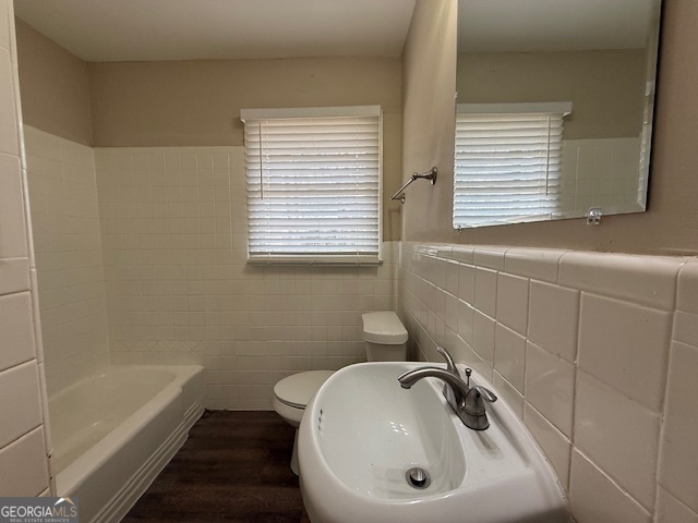1068 Longshore Drive Decatur, GA 30032 - Photo 5 of 9 a bathroom with a sink a window and a bathtub