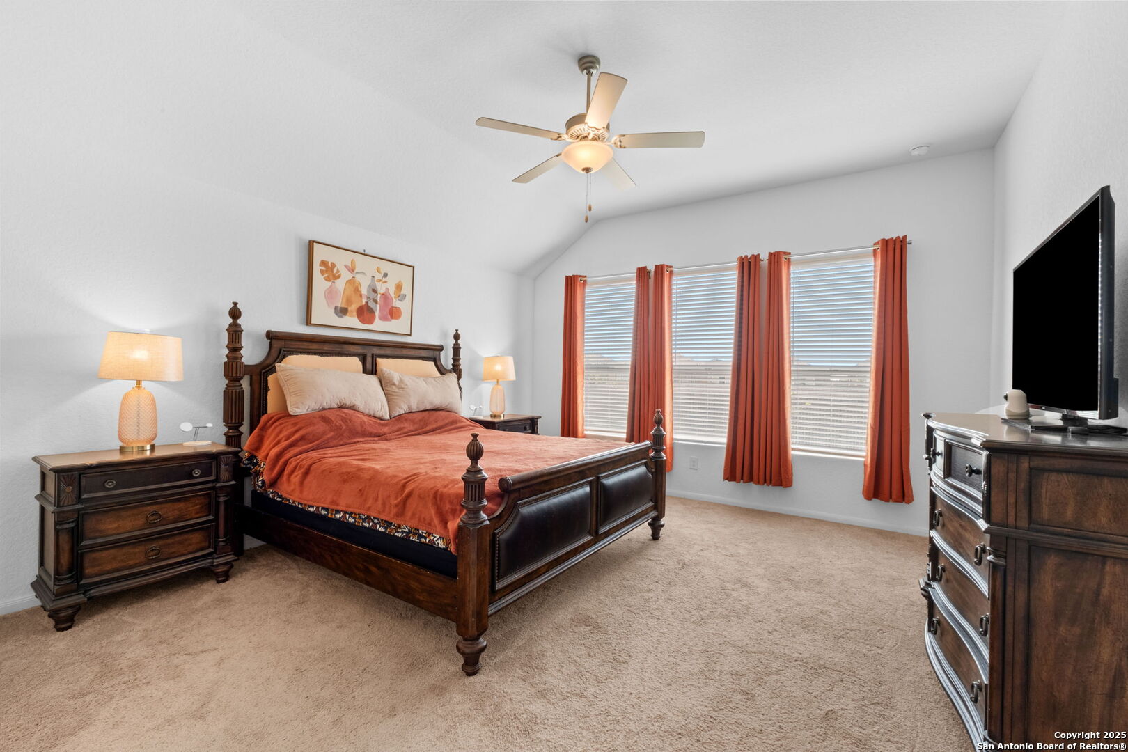 8950 Rancher Place Seguin, TX 78155 - Photo 16 of 34 a bedroom with a bed and a flat screen tv