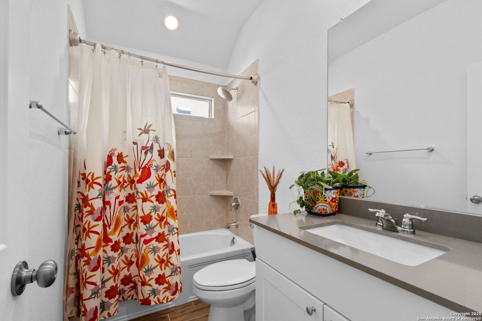 8950 Rancher Place Seguin, TX 78155 - Photo 22 of 34 a bathroom with a granite countertop sink toilet and shower