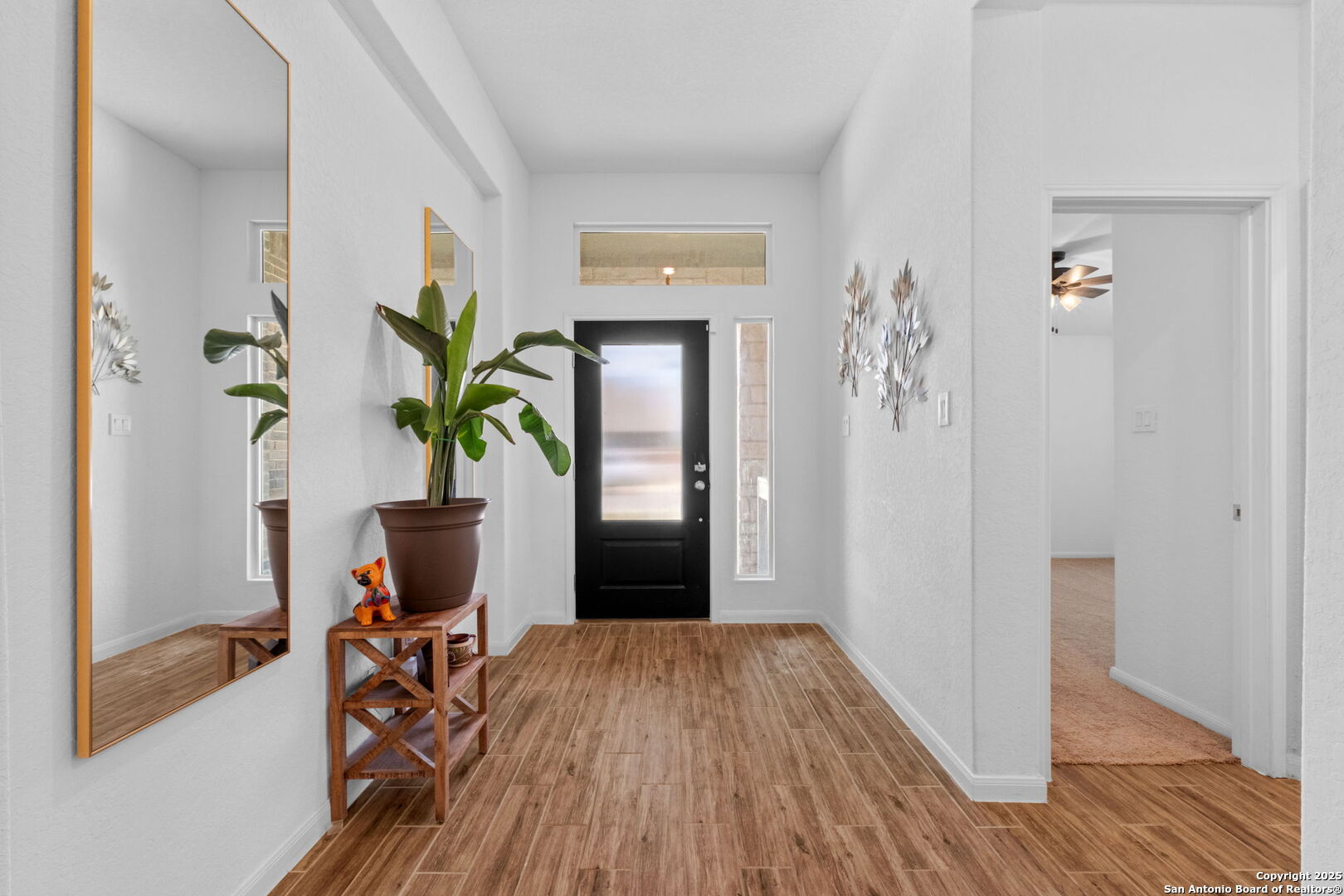 8950 Rancher Place Seguin, TX 78155 - Photo 28 of 34 a view of a workspace room with wooden floor and lounge chair