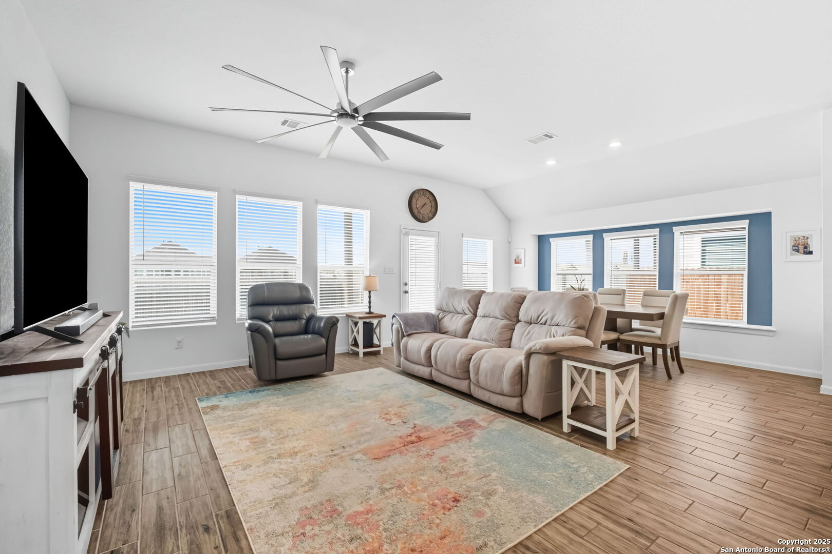 8950 Rancher Place Seguin, TX 78155 - Photo 9 of 34 a living room with furniture and a flat screen tv