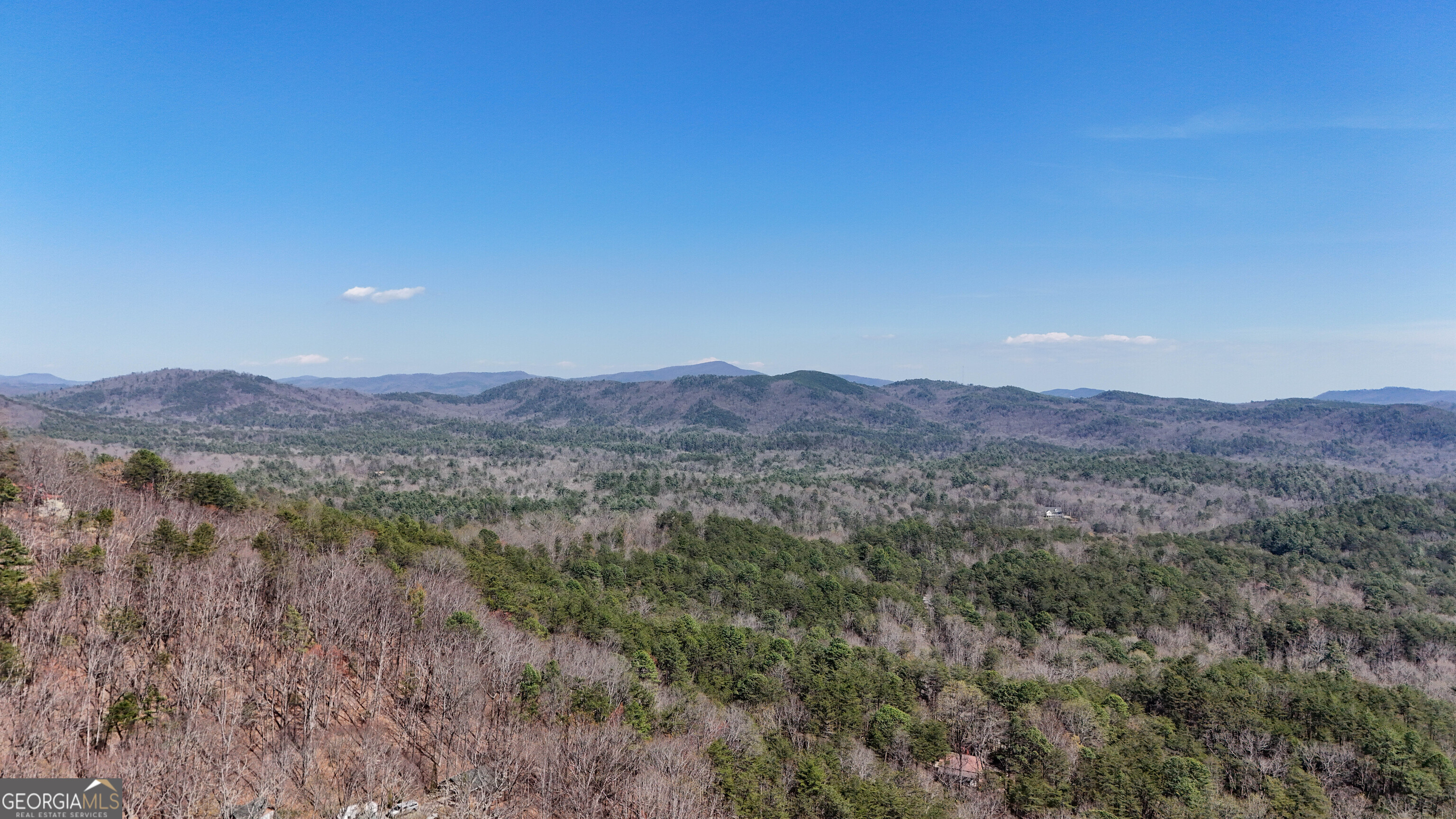 6 Chimney Mountain Road Sautee Nacoochee, GA 30571 - Photo 2 of 72 a view of a mountain range with trees in the background