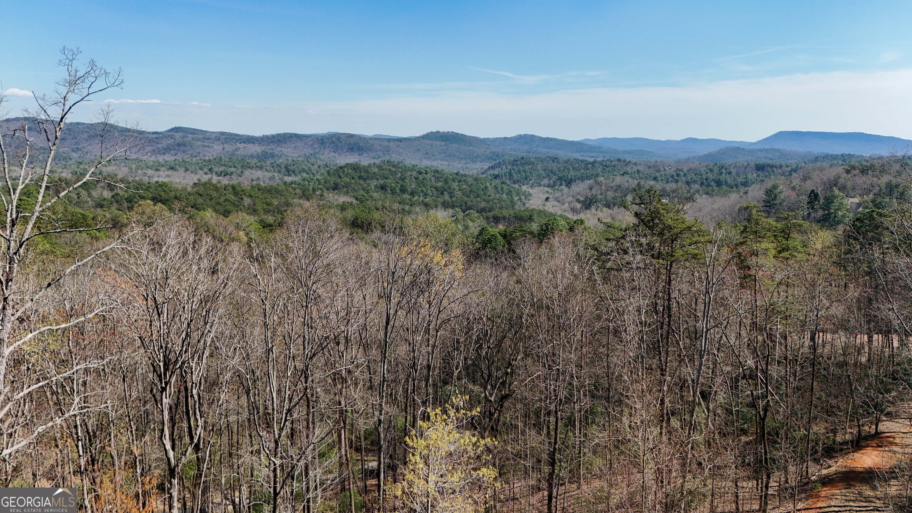 6 Chimney Mountain Road Sautee Nacoochee, GA 30571 - Photo 24 of 72 a view of a town with mountains in the background