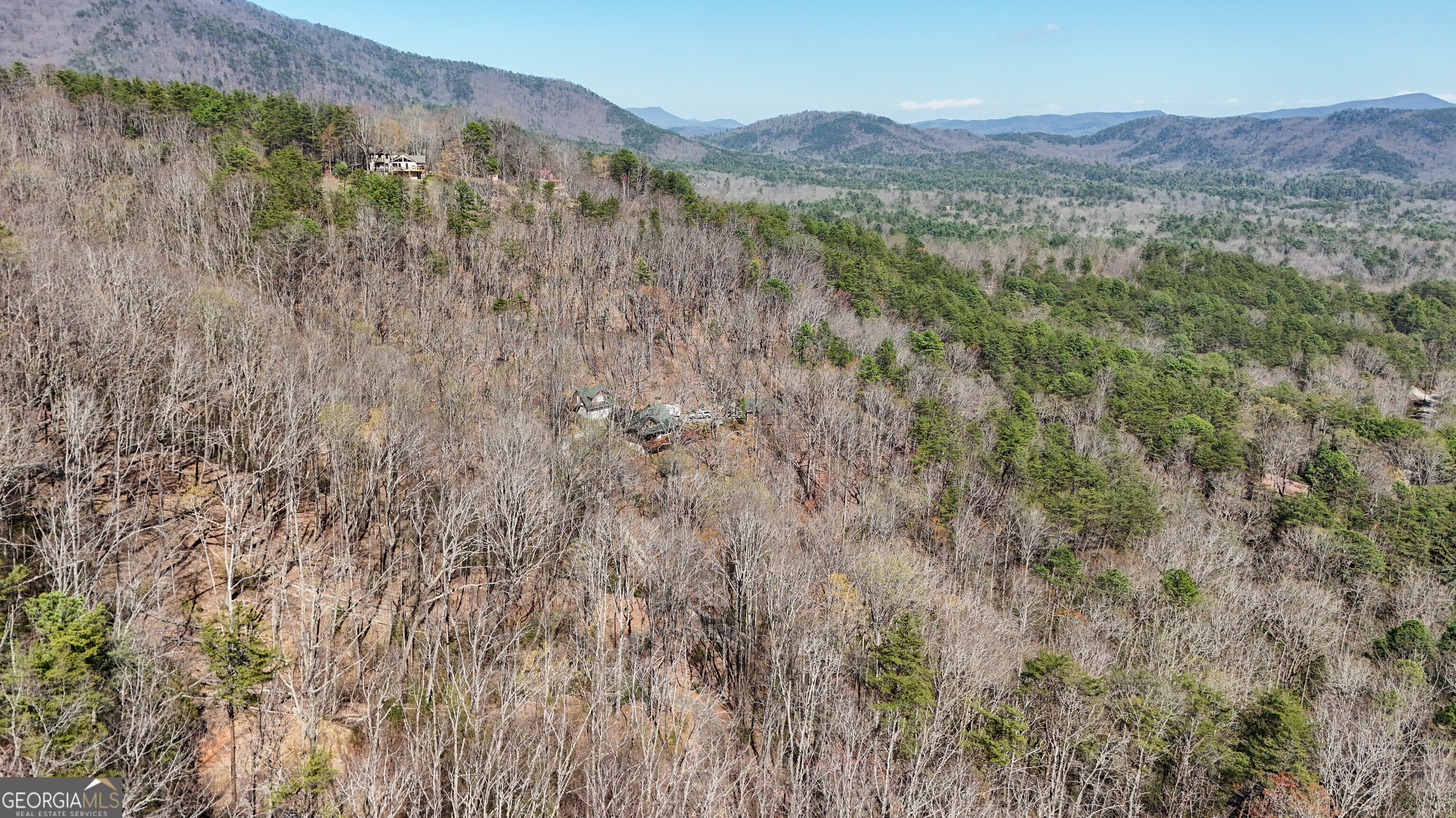 6 Chimney Mountain Road Sautee Nacoochee, GA 30571 - Photo 39 of 72 a view of a lush green hillside and a building
