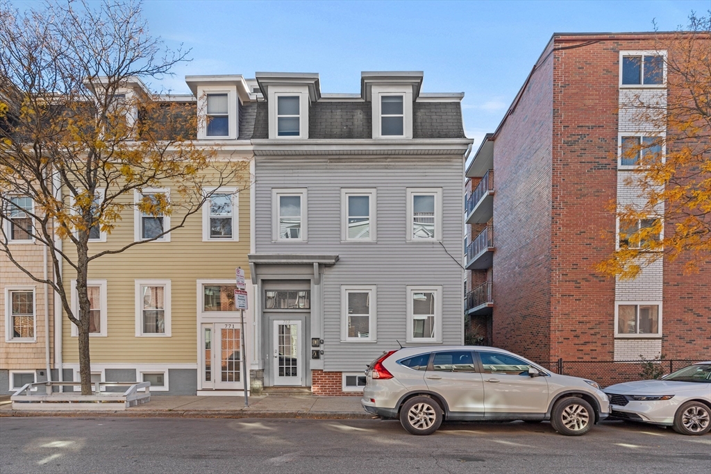 769 East 6th Street, Unit 1 Boston, MA 02127 - Photo 17 of 18 a car parked in front of a building