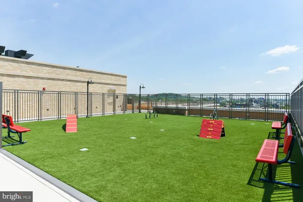 a living room with fireplace furniture and a flat screen tv