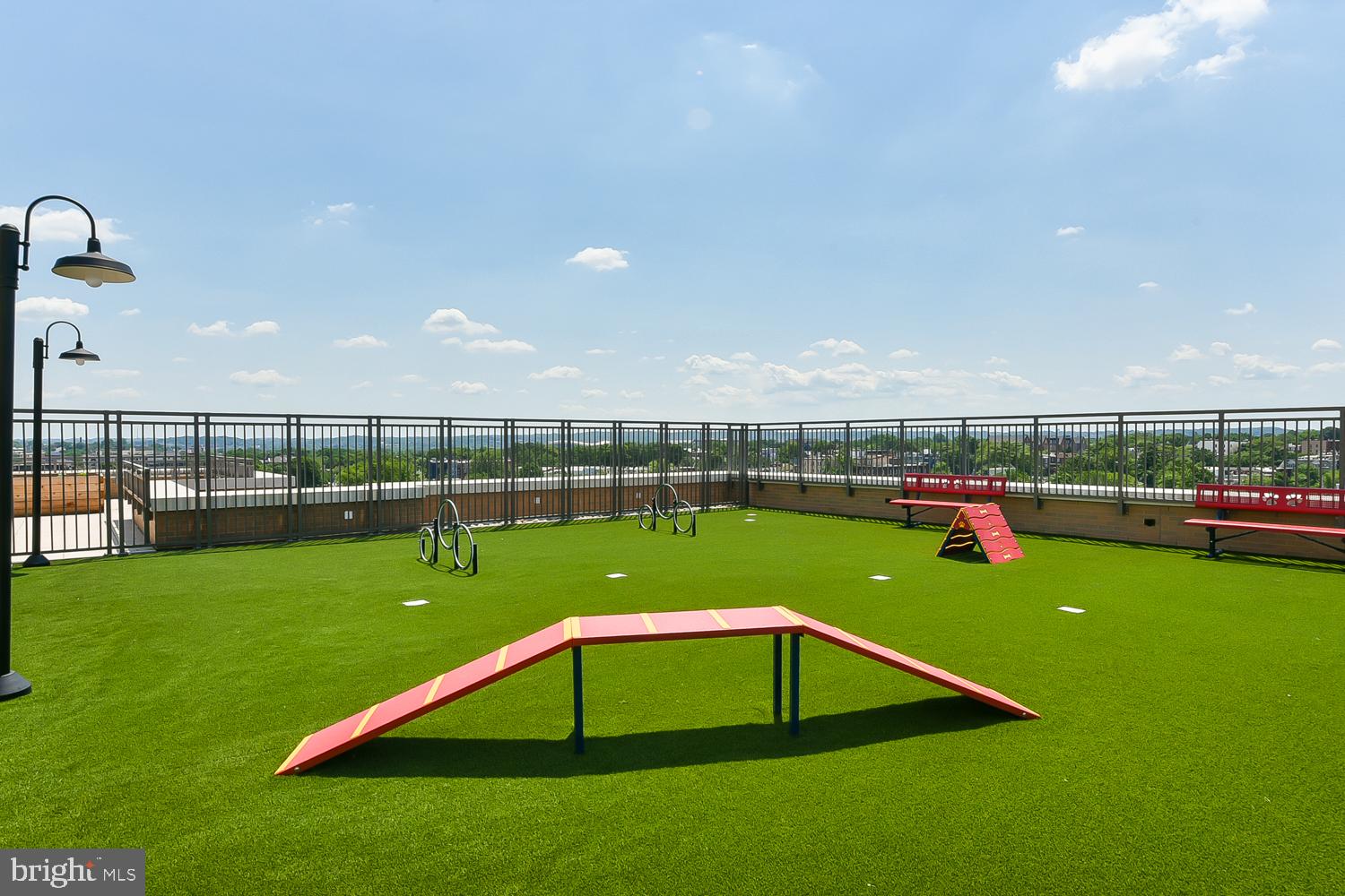 901 H Street Northeast, Unit 643 Washington, DC 20002 - Photo 63 of 82 a view of a backyard with a garden and entertaining space
