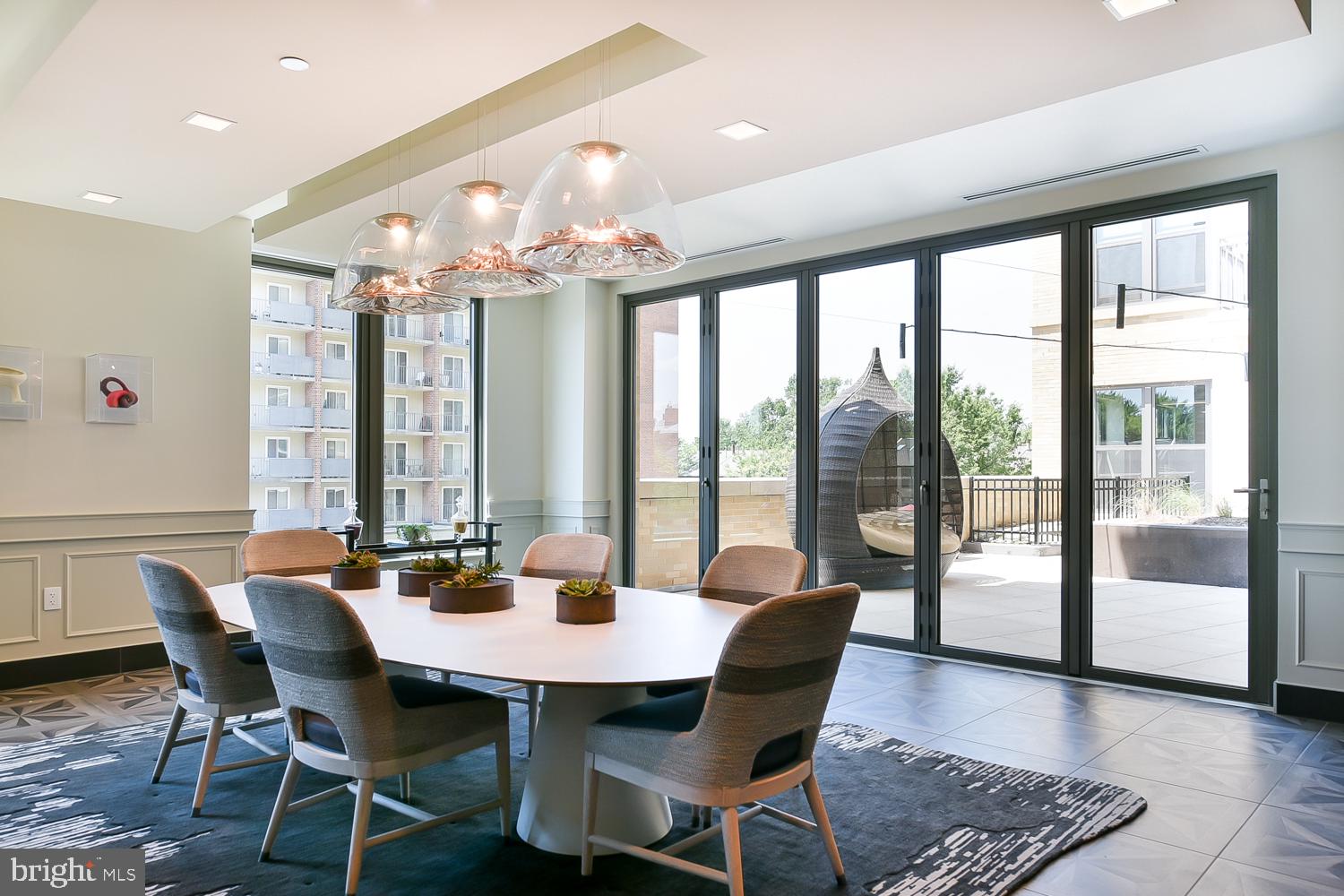 901 H Street Northeast, Unit 643 Washington, DC 20002 - Photo 74 of 82 a view of a dining room with furniture window and wooden floor