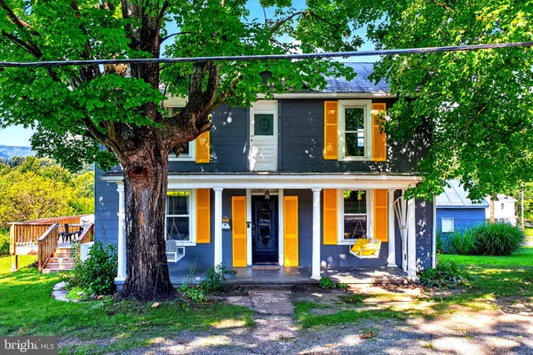 front view of house with a yard