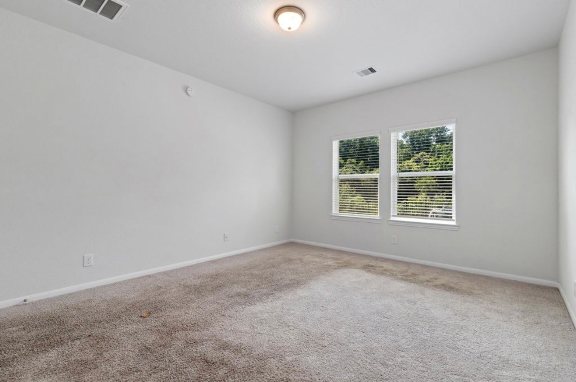 5319 Rivers Edge Drive Richmond, TX 77469 - Photo 11 of 24 an empty room with a window