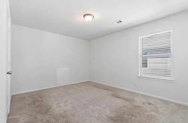 an empty room with a window
