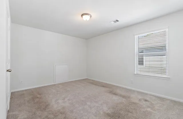 an empty room with a window