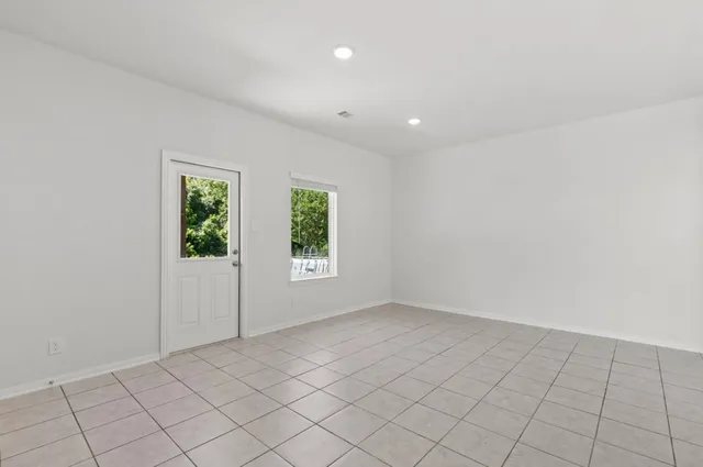 an empty room with windows