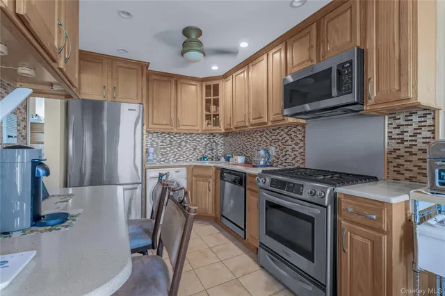 a kitchen with a table chairs and a stove