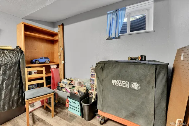 a swimming pool with outdoor seating and yard