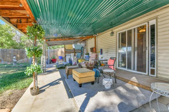 a view of a table and chairs in patio