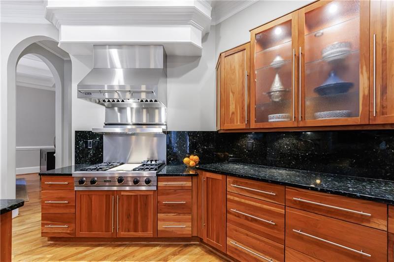 1255 Beech Haven Road Northeast Atlanta, GA 30324 - Photo 19 of 87 a kitchen with stainless steel appliances granite countertop a stove a sink and a microwave