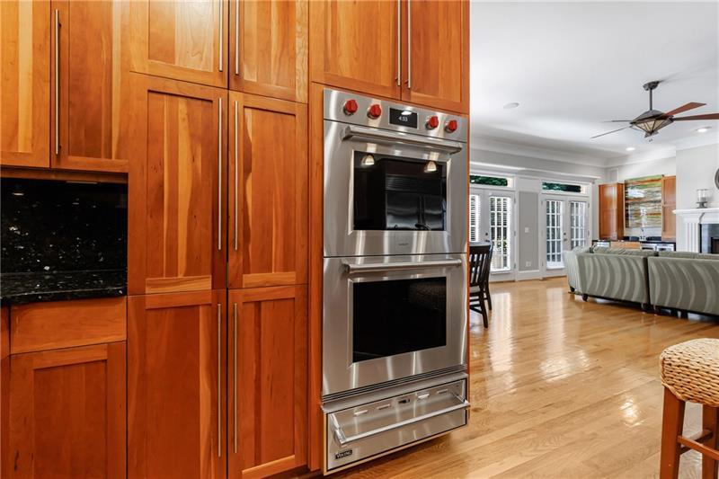 1255 Beech Haven Road Northeast Atlanta, GA 30324 - Photo 21 of 87 a kitchen with stainless steel appliances granite countertop a refrigerator and a stove top oven