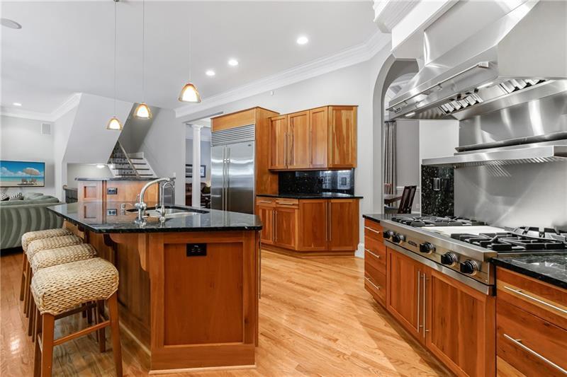 1255 Beech Haven Road Northeast Atlanta, GA 30324 - Photo 22 of 87 a kitchen with stainless steel appliances granite countertop a stove and a refrigerator