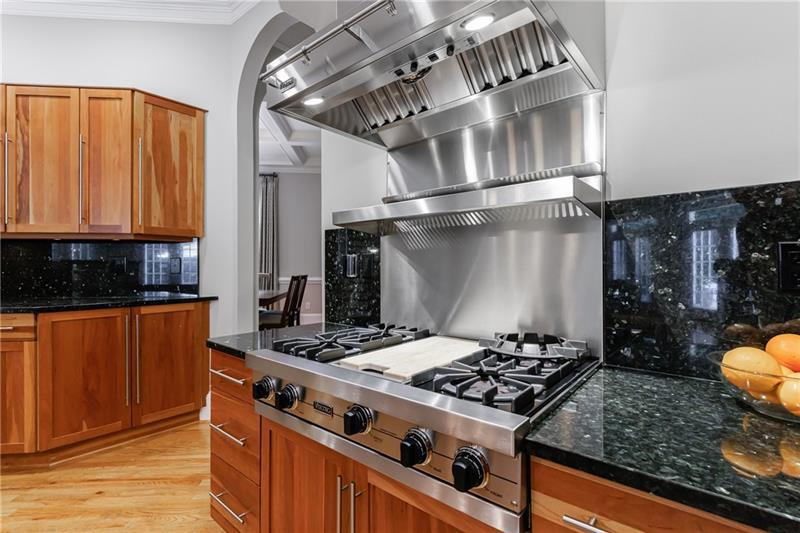 1255 Beech Haven Road Northeast Atlanta, GA 30324 - Photo 23 of 87 a kitchen with a stove and a refrigerator