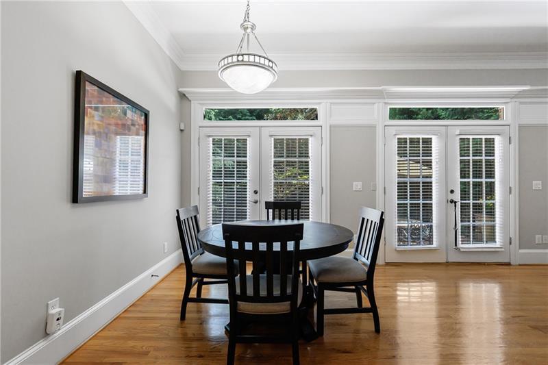 1255 Beech Haven Road Northeast Atlanta, GA 30324 - Photo 28 of 87 a view of a dining room with furniture window and wooden floor