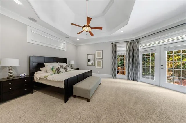 a bathroom with a sink mirror and toilet